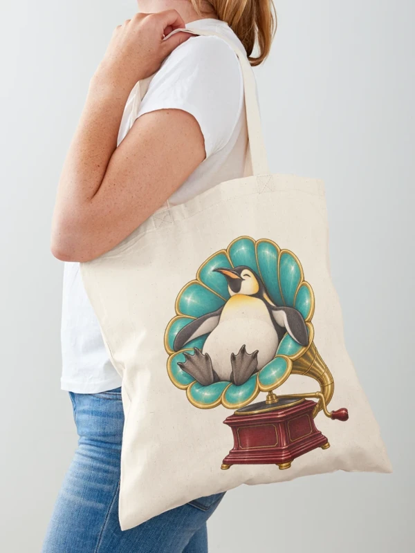 Manchot détendu dans un gramophone ancien sur Tote bag classique