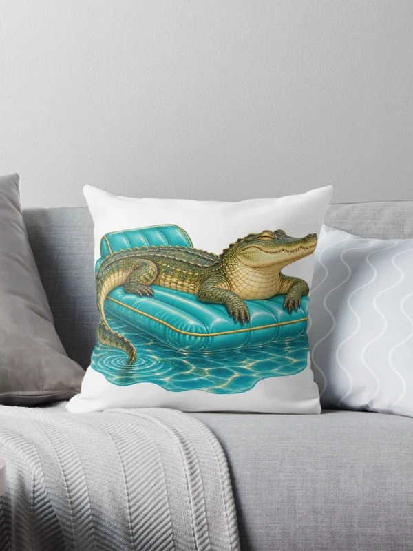Crocodile en vacances sur son matelas gonflable sur Coussin