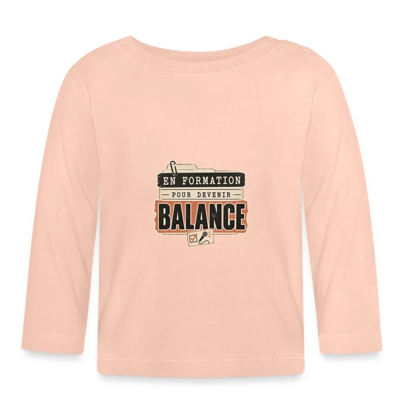 En formation pour devenir balance sur T-shirt manches longues bio Bébé · rose cristal