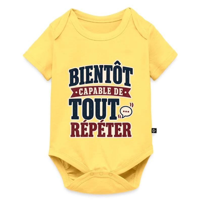 Bientôt capable de tout répéter sur Body à manches courtes Premium Bébé · jaune pastel