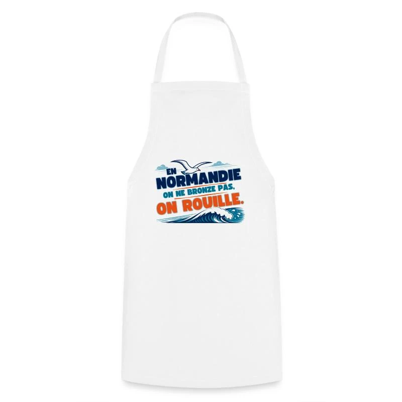 Normandie, on ne bronze pas, on rouille sur Tablier de cuisine · blanc